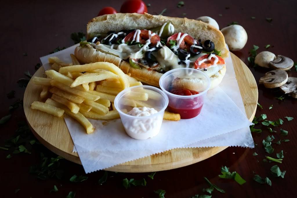 Amigos Pizza | restaurant | 6400 International Dr suite 160, Orlando, FL 32819, USA | 4072035522 OR +1 407-203-5522