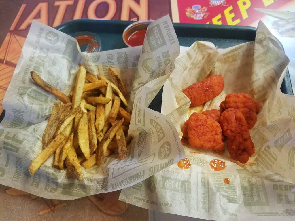Wingstop | restaurant | 7035 West Grand Parkway South, Richmond, TX 77407, USA | 8325959464 OR +1 832-595-9464