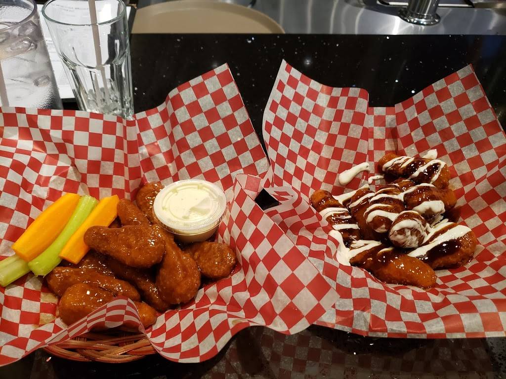 Wing House | restaurant | 320 Water St, Peterborough, ON K9J 3C7, Canada | 7058747555 OR +1 705-874-7555