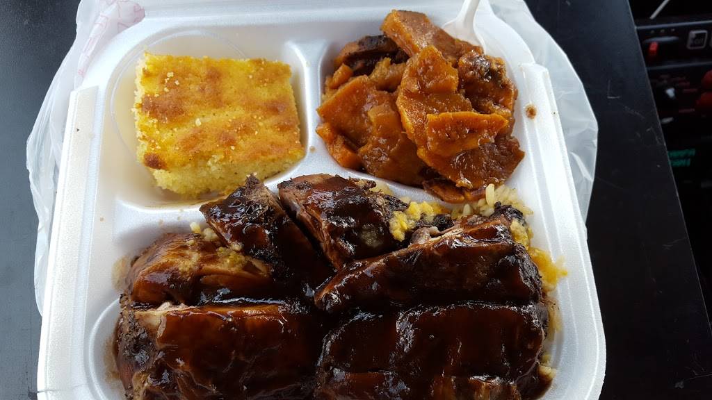 One Stop Jerk Center Jamaican | restaurant | 2108 N Howard Ave, Tampa, FL 33607, USA | 8132589099 OR +1 813-258-9099