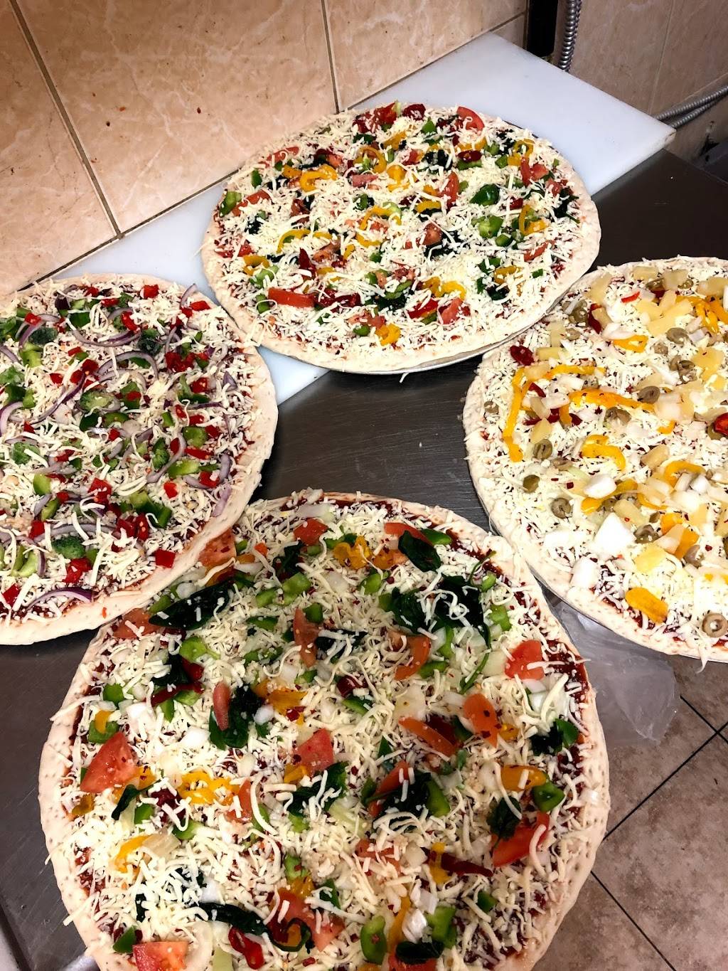 Twice The Deal Pizza | restaurant | 8 Bloomingdale Rd N, Kitchener, ON N2K 1A2, Canada | 5195842333 OR +1 519-584-2333