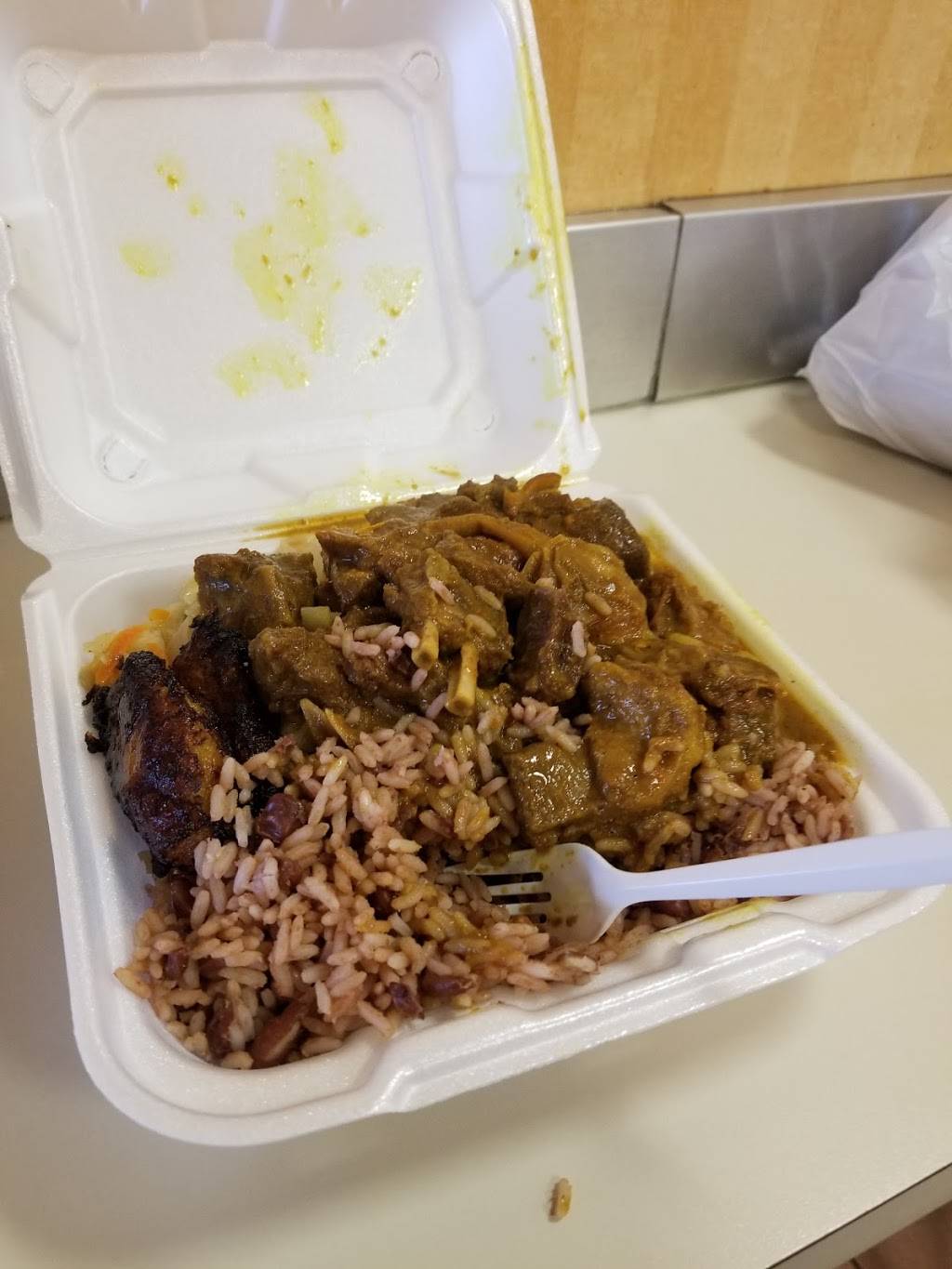 Golden Krust | restaurant | 40 W Shopping Center, 838 N Rolling Rd, Catonsville, MD 21228, USA | 4107190066 OR +1 410-719-0066