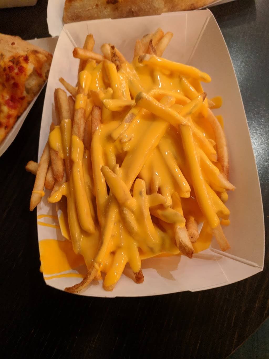 Frankies by the Slice | meal takeaway | 600 E Grand Ave, Chicago, IL 60611, USA | 3125467440 OR +1 312-546-7440