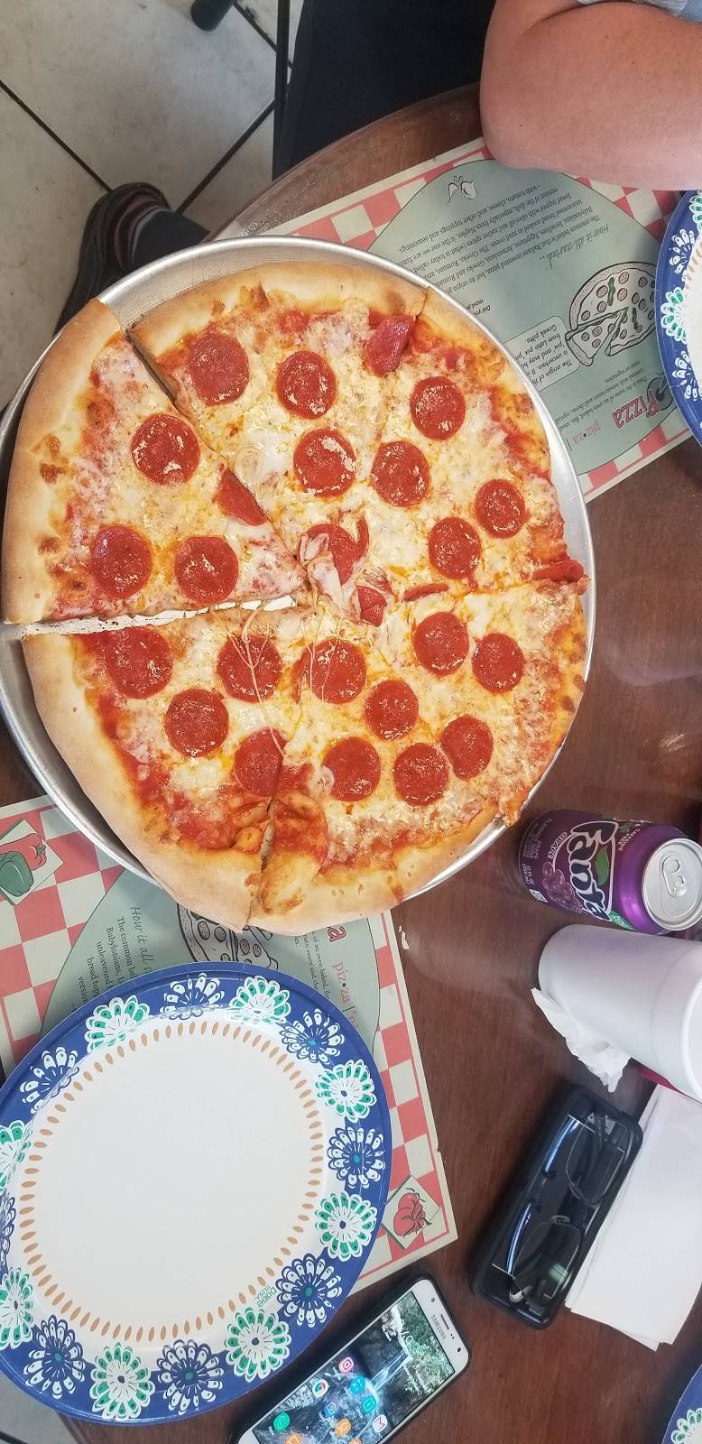 Ninos Pizza & Restaurant | restaurant | 6194 Edgewater Dr, Orlando, FL 32810, USA | 4072537363 OR +1 407-253-7363