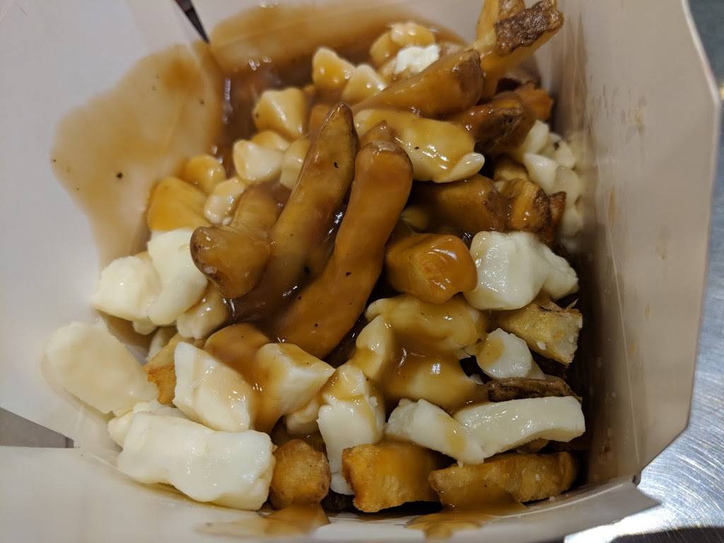 Smokes Poutinerie | restaurant | 20 Wyndham St N, Guelph, ON N1H 4E5, Canada | 5197802617 OR +1 519-780-2617