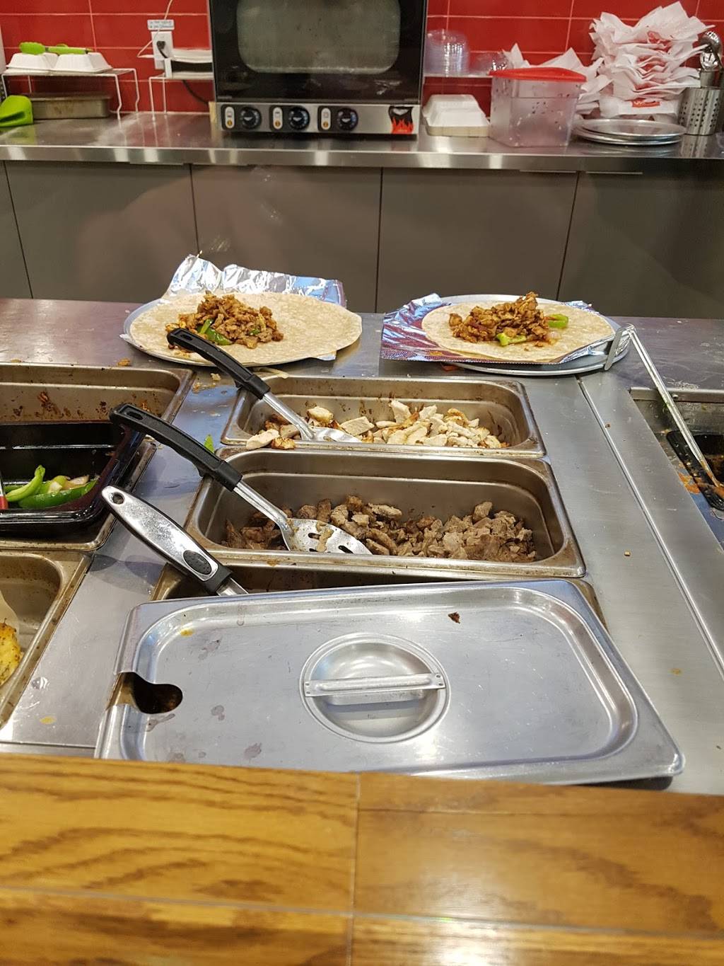 Quesada Burritos & Tacos | restaurant | 1129 Boulevard Saint-Martin O, Laval, QC H7S 1M8, Canada | 4509758226 OR +1 450-975-8226