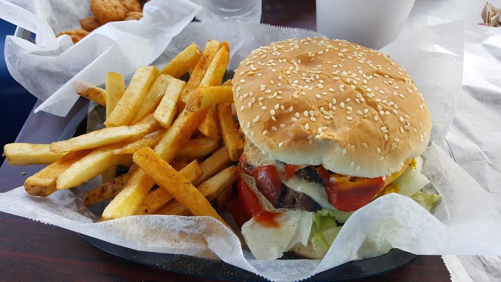 Quickies Burgers & Wings | restaurant | 1000 S State Rd 7, Hollywood, FL 33023, USA | 9549819464 OR +1 954-981-9464