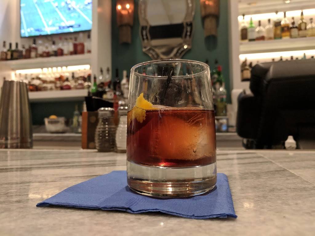 Poets Modern Cocktails & Eats | restaurant | 24 W Franklin St, Baltimore, MD 21201, USA | 4104891580 OR +1 410-489-1580