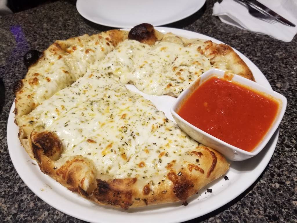 Ricos Pizzeria | restaurant | 972 Hamilton Rd, London, ON N5W 1V6, Canada | 5194559050 OR +1 519-455-9050