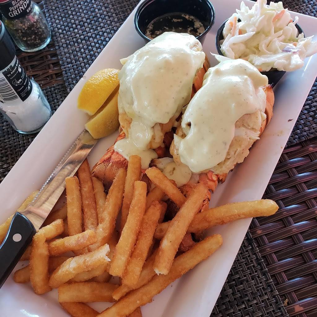 Snooks Bayside Restaurant & Grand Tiki | restaurant | 99470 Overseas Hwy, Key Largo, FL 33037, USA | 3054535004 OR +1 305-453-5004