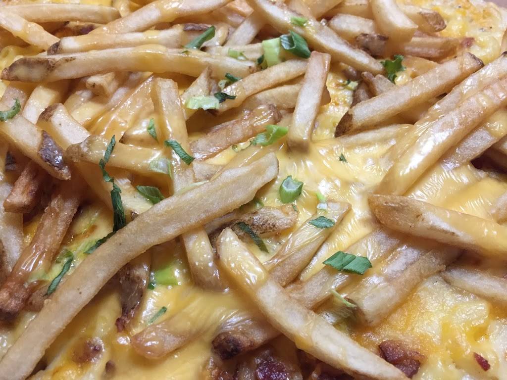 Guy Fieris Pizza Parlor | restaurant | 1976 Power Plant Pkwy Suite B, Hampton, VA 23666, USA | 7578278100 OR +1 757-827-8100