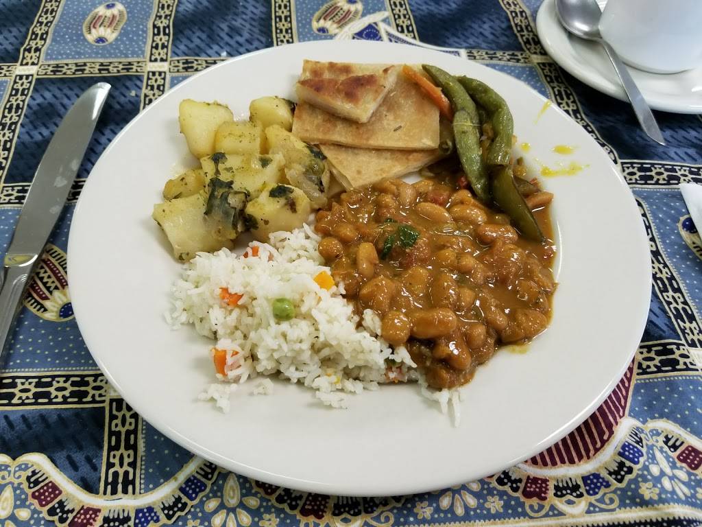 Simba Ugandan Restaurant | restaurant | 8531 Olive Blvd, St. Louis, MO 63132, USA | 3144965773 OR +1 314-496-5773