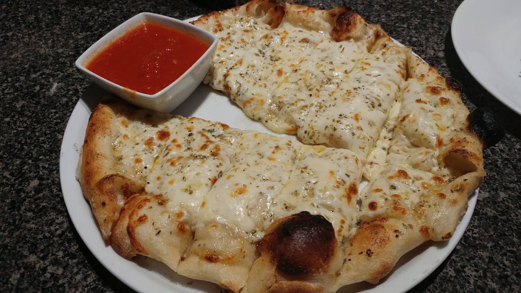 Ricos Pizzeria | restaurant | 972 Hamilton Rd, London, ON N5W 1V6, Canada | 5194559050 OR +1 519-455-9050