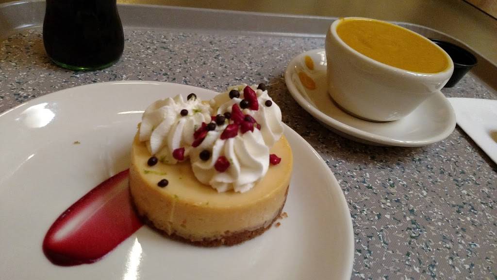 Rozzelle Court Restaurant | restaurant | 4525 Oak St, Kansas City, MO 64111, USA | 8167511278 OR +1 816-751-1278