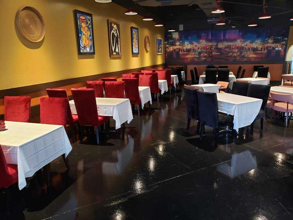 Justins Caribbean Fusion Restaurant | restaurant | 6700 Conroy Rd Ste 120, Orlando, FL 32835, USA | 4078660270 OR +1 407-866-0270