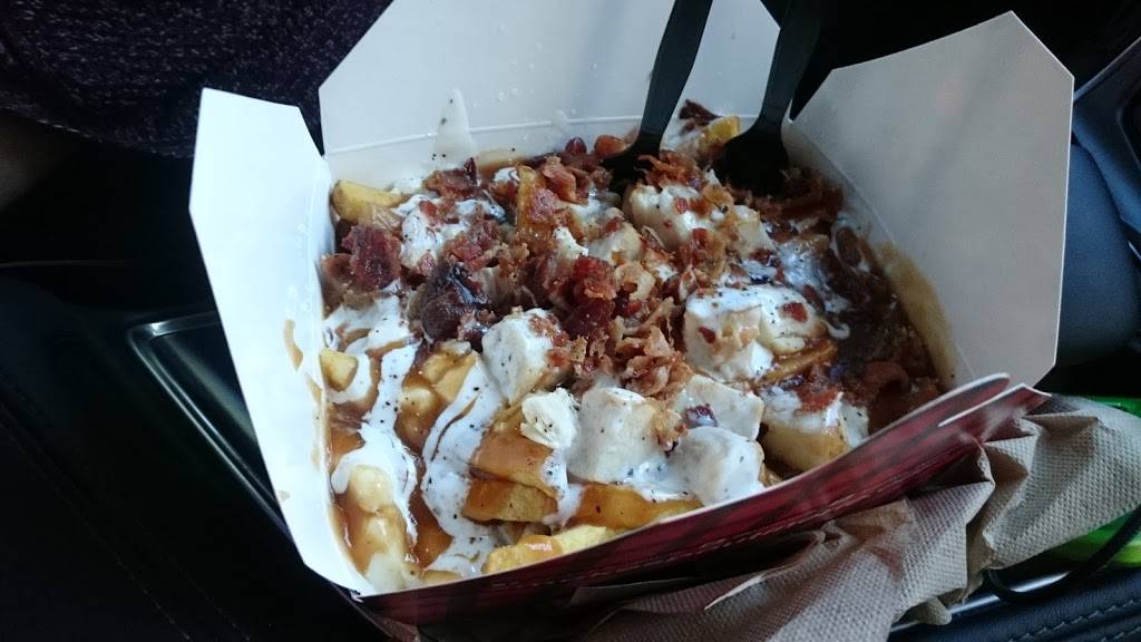 Smokes Poutinerie | restaurant | 20 Wyndham St N, Guelph, ON N1H 4E5, Canada | 5197802617 OR +1 519-780-2617