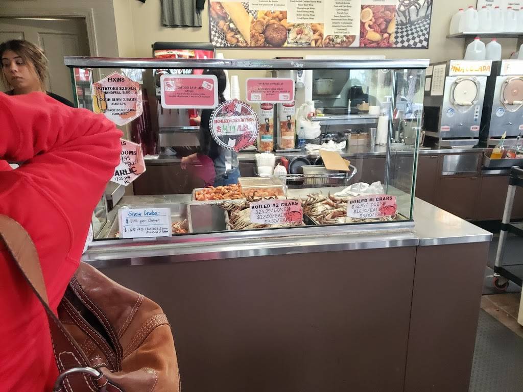 The Seafood Pot | restaurant | 14386 River Rd, New Sarpy, LA 70078, USA | 9857250053 OR +1 985-725-0053