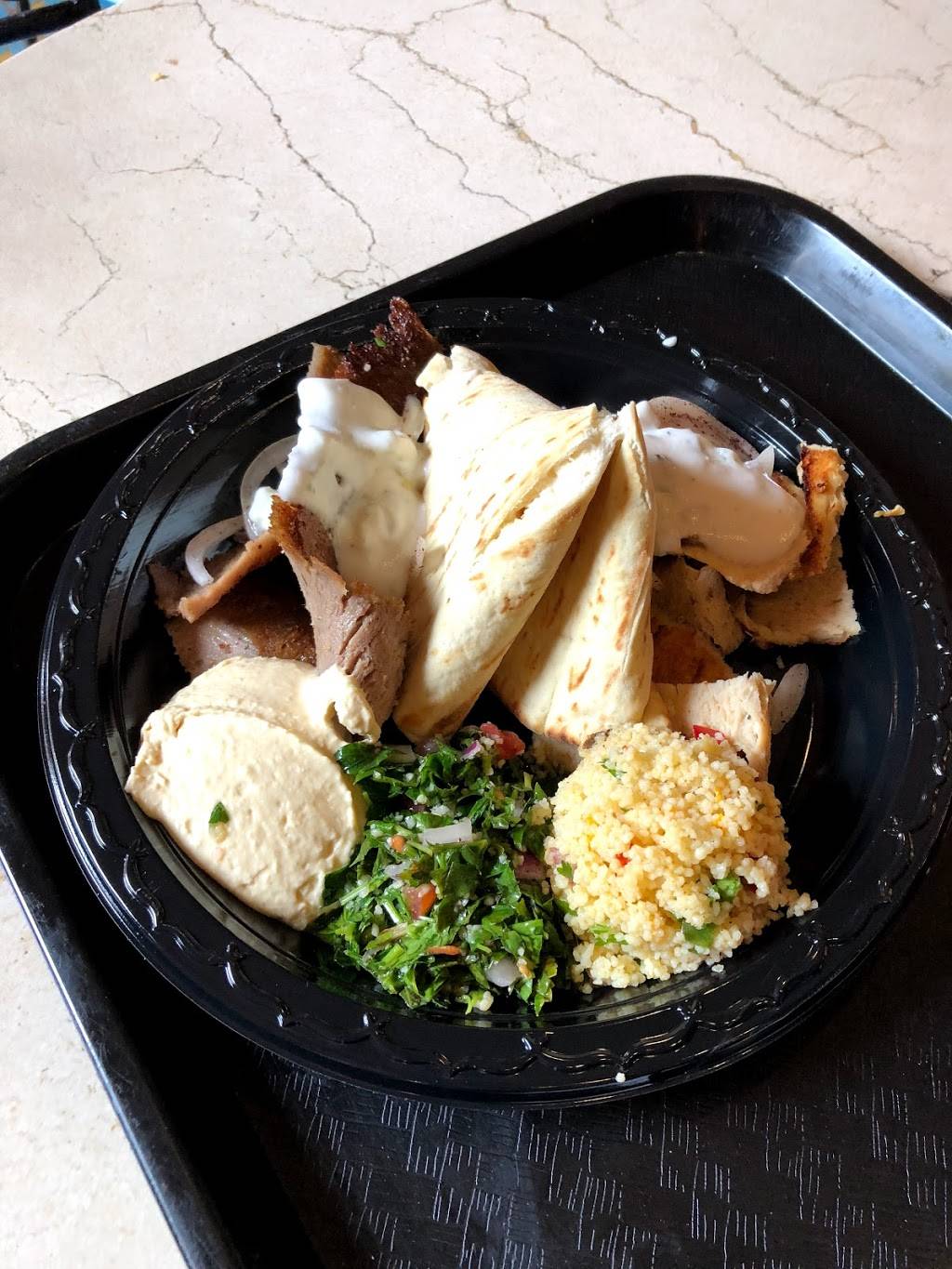 Tangierine Café | restaurant | 1510 North Avenue of the Stars, Orlando, FL 32830, USA | 4079393463 OR +1 407-939-3463