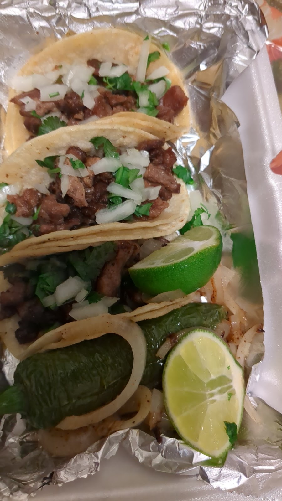 Titos Tacos and Food | restaurant | 400 Candelaria Rd NW, Albuquerque, NM 87107, USA | 5057157320 OR +1 505-715-7320