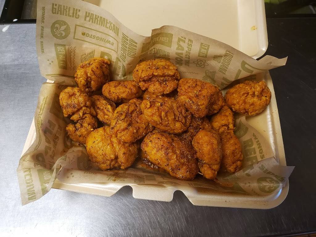 Wingstop | restaurant | 9804 Jones Rd a, Houston, TX 77065, USA | 2814779464 OR +1 281-477-9464