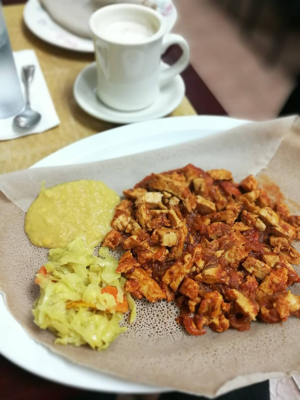 Kaffa Crossing Ethiopian Restaurant, Bar & Cafe | restaurant | 4421 Chestnut St, Philadelphia, PA 19104, USA | 2153860504 OR +1 215-386-0504