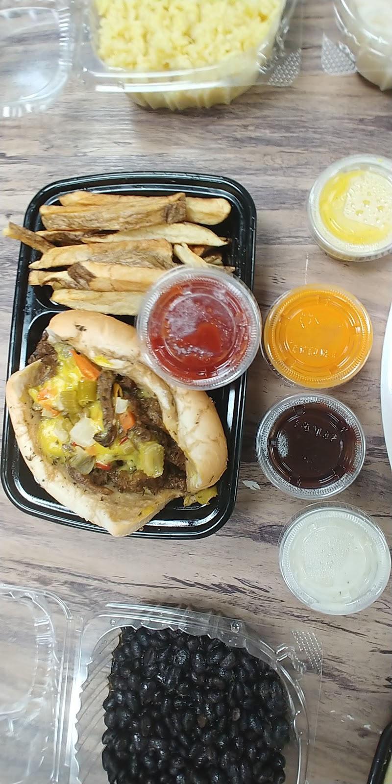 Versatile Jerk and Vegan | restaurant | 9 N 5th Ave, Maywood, IL 60153, USA | 3124028591 OR +1 312-402-8591