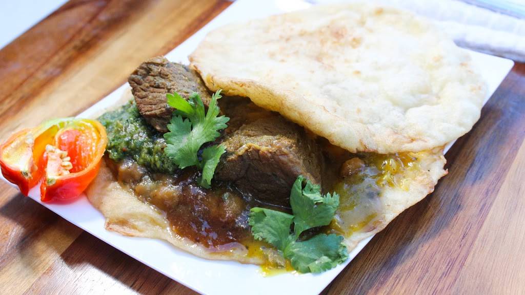 Lenas Roti & Doubles | restaurant | 6990 Financial Dr, Mississauga, ON L5N 8J4, Canada | 9058214000 OR +1 905-821-4000