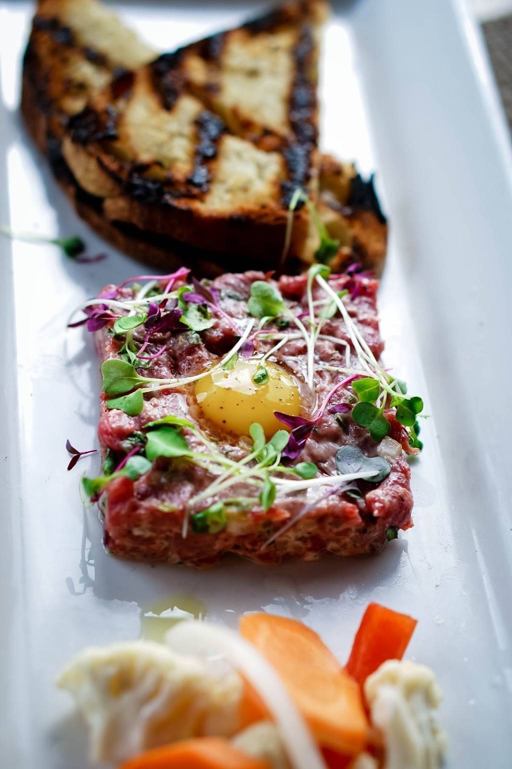 Slate Restaurant | restaurant | 8323 Sand Lake Rd, Orlando, FL 32819, USA | 4075007528 OR +1 407-500-7528