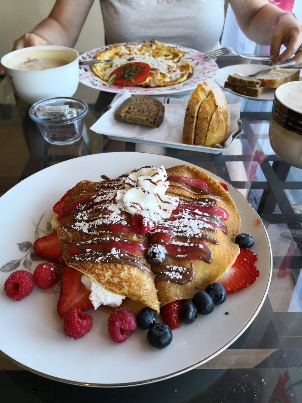 Around the World Cafe Bakery | restaurant | 119 5th Ave, Indialantic, FL 32903, USA | 3213609284 OR +1 321-360-9284