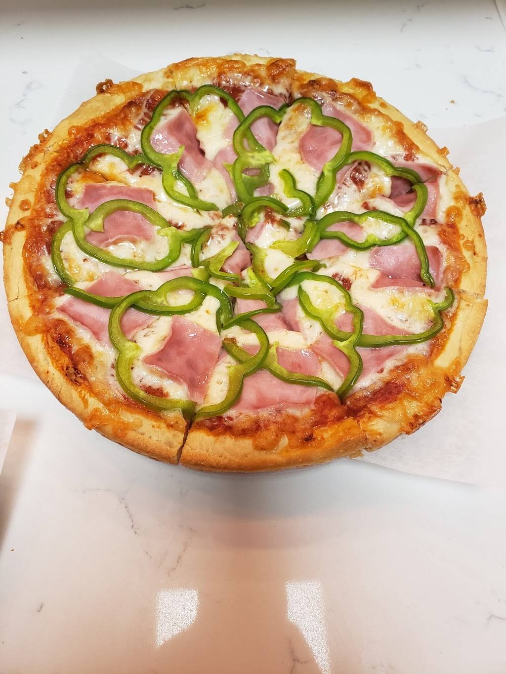 Singas Famous Pizza | restaurant | 37-11 Junction Blvd, Queens, NY 11368, USA | 9177451500 OR +1 917-745-1500