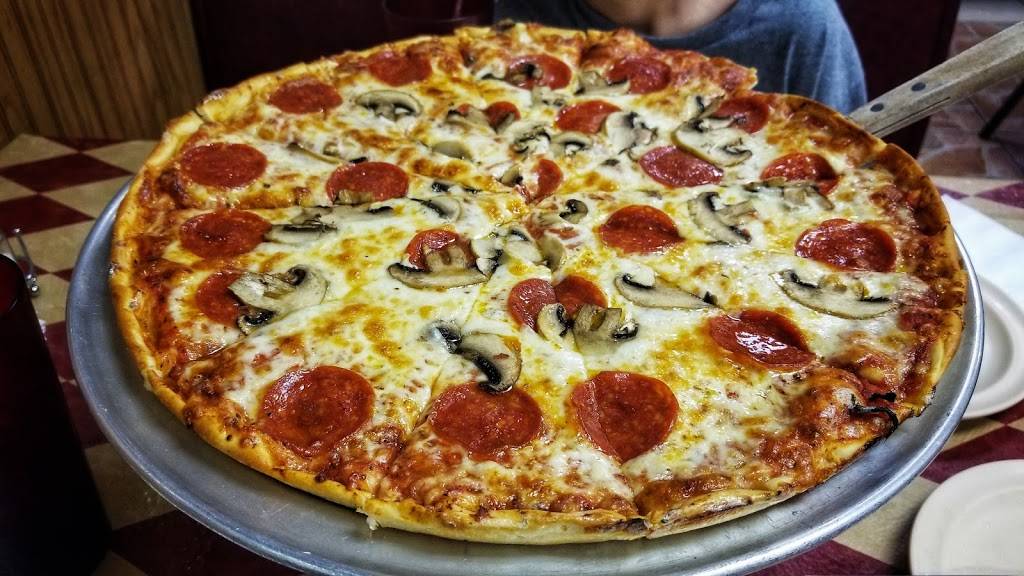 Mannys Pizza | restaurant | 4606 S Clyde Morris Blvd, Port Orange, FL 32129, USA | 3867677599 OR +1 386-767-7599