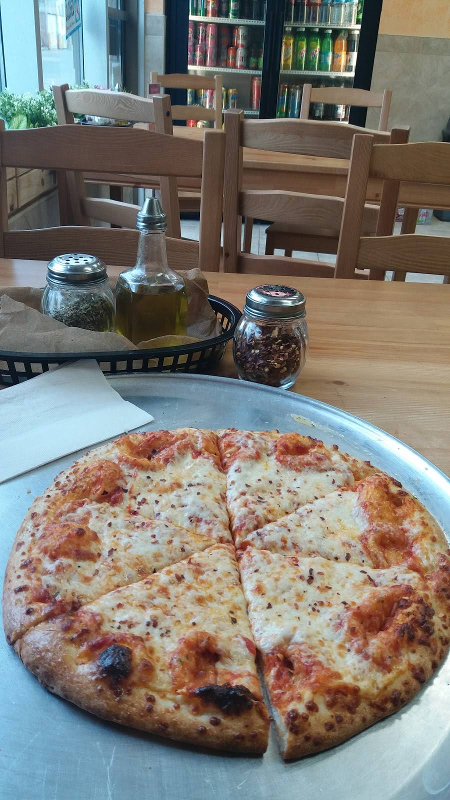 Pizza Village | restaurant | 11399 Keele St, Maple, ON L6A 4E1, Canada | 9058321313 OR +1 905-832-1313