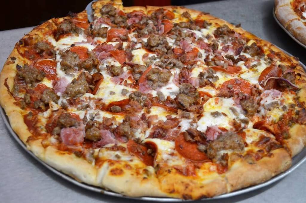 Mr.Es Pizza | restaurant | 46 W Lake St, Sand Lake, MI 49343, USA | 6165573060 OR +1 616-557-3060