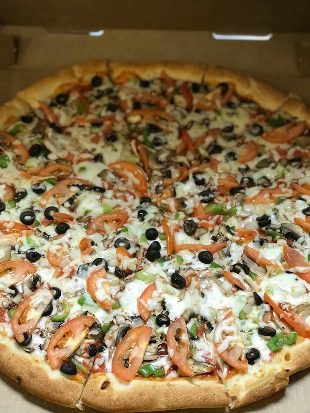 Mad Hatters Pizza | restaurant | 115 Geneva Dr, Oviedo, FL 32765, USA | 4073653808 OR +1 407-365-3808