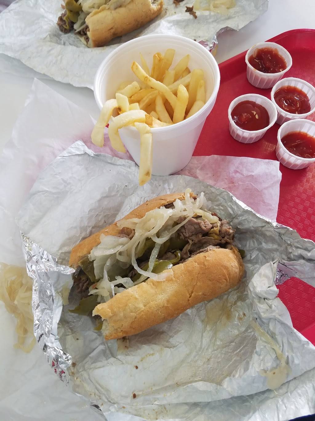 Lulus Hot Dogs | restaurant | 1000 S Leavitt St, Chicago, IL 60612, USA | 3122433444 OR +1 312-243-3444