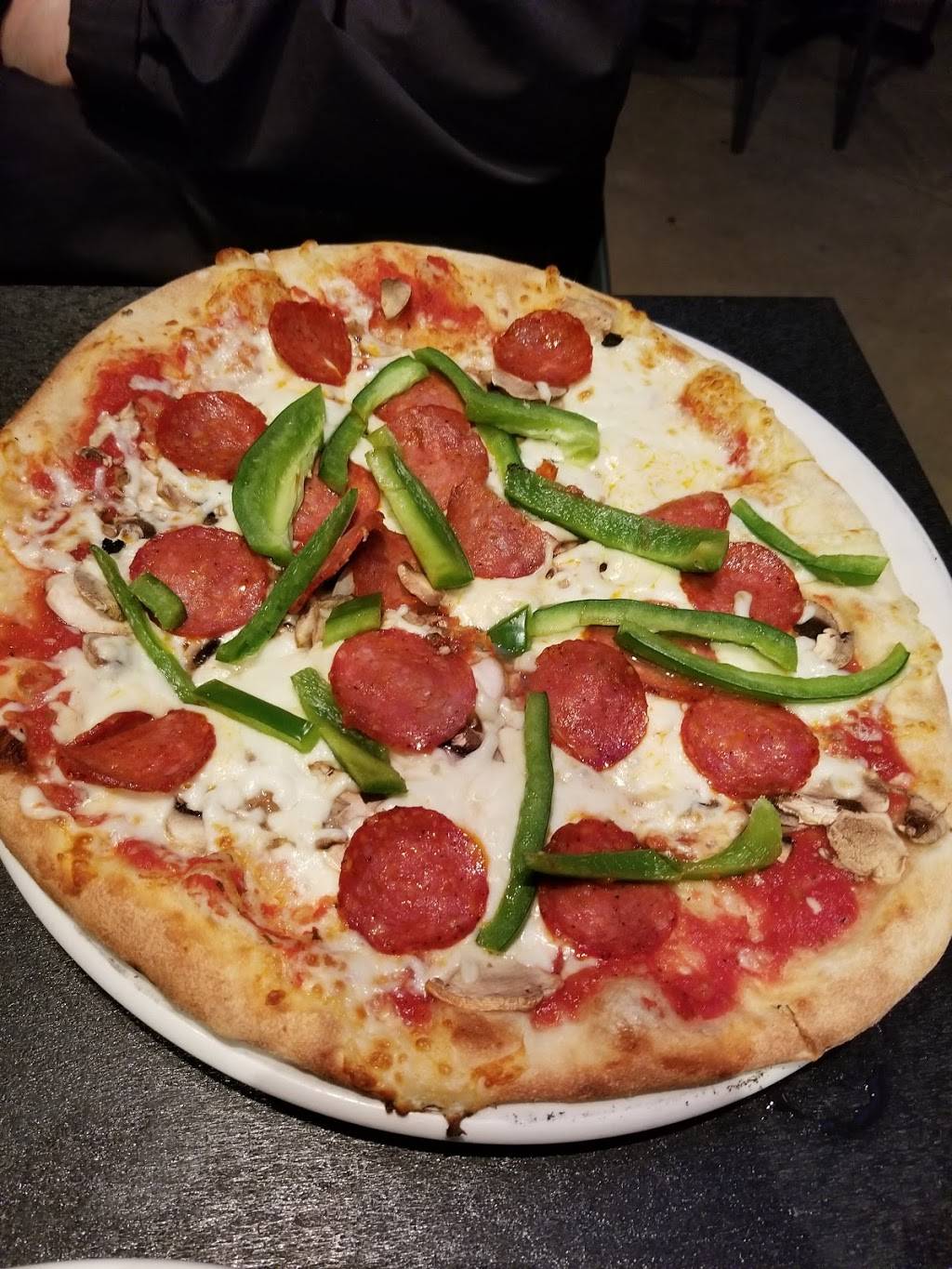 Wooden Heads Gourmet Pizza | restaurant | 192 Ontario St, Kingston, ON K7L 2Y8, Canada | 6135491812 OR +1 613-549-1812