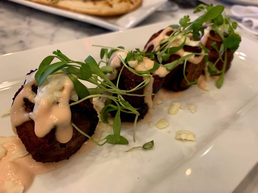 Estefan Kitchen Orlando | restaurant | 3269 Margaritaville Blvd, Kissimmee, FL 34747, USA | 4078280999 OR +1 407-828-0999