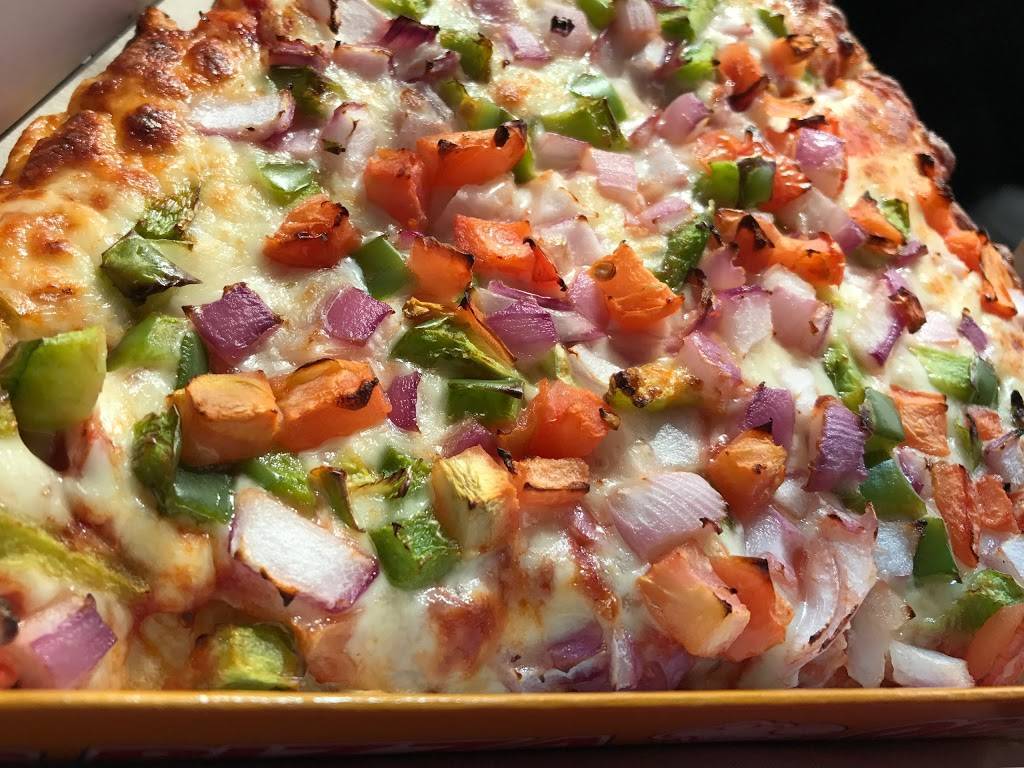 Ginos Pizza | restaurant | 45 Dusk Dr, Brampton, ON L6Y 0H7, Canada | 8663104466 OR +1 866-310-4466