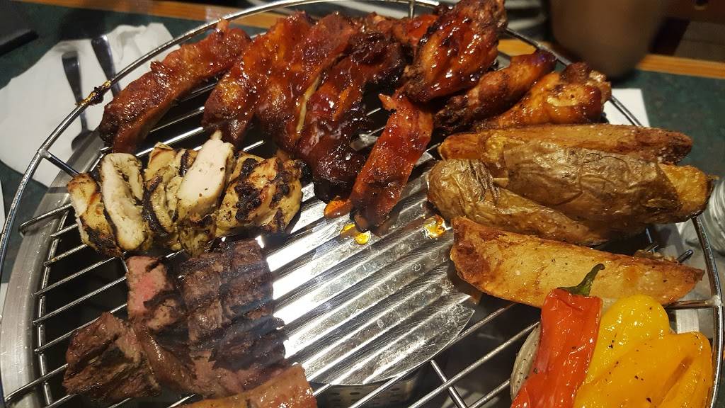 Smokey Bones Bar & Fire Grill | meal takeaway | 2660 S Dirksen Pkwy, Springfield, IL 62704, USA | 2175286410 OR +1 217-528-6410