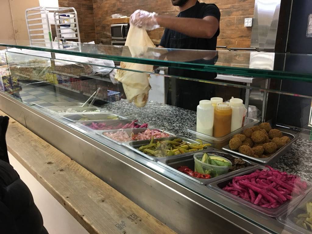 Flaming Stove | restaurant | 21 Davisville Ave, Toronto, ON M4S 1G3, Canada | 4166445051 OR +1 416-644-5051