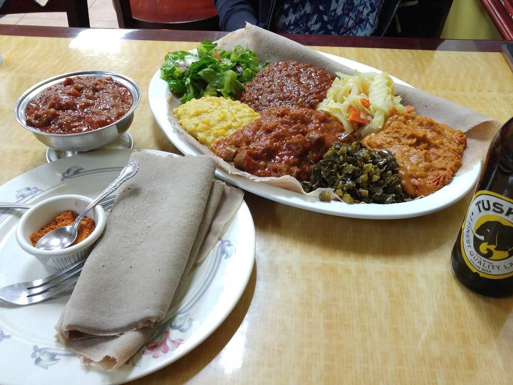 Kaffa Crossing Ethiopian Restaurant, Bar & Cafe | restaurant | 4421 Chestnut St, Philadelphia, PA 19104, USA | 2153860504 OR +1 215-386-0504