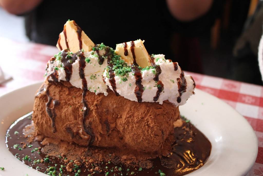 Cowgirl | restaurant | 519 Hudson St, New York, NY 10014, USA | 2126331133 OR +1 212-633-1133