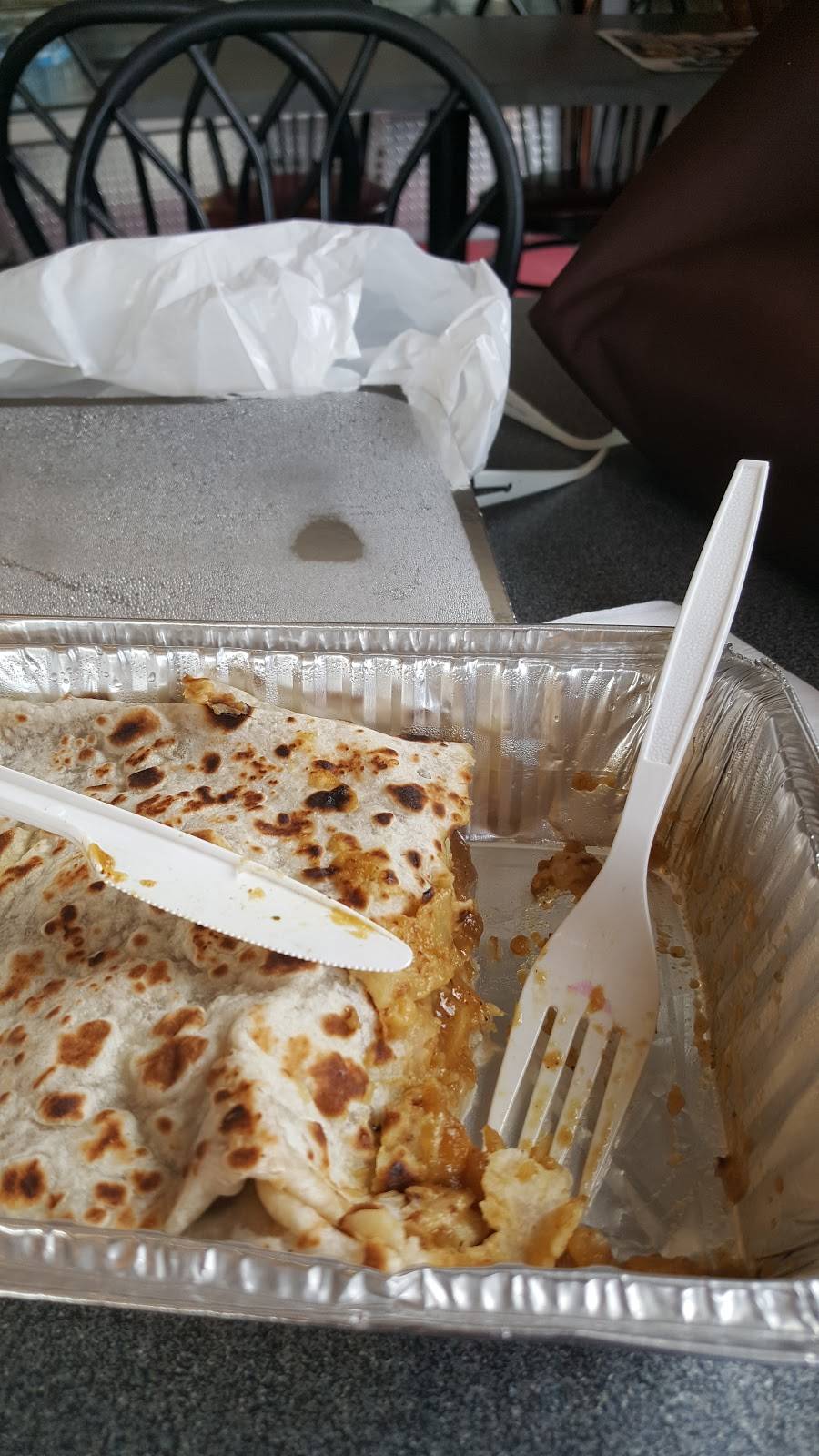 Roti Time | restaurant | 2542 St Clair Ave W, York, ON M6N 1L7, Canada | 4169018311 OR +1 416-901-8311