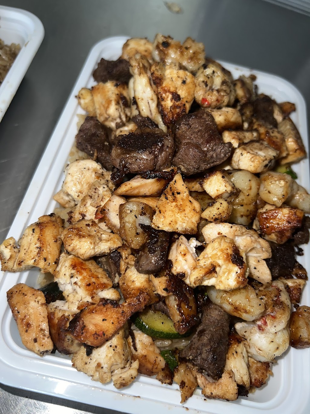 Hoodbachi Grill | restaurant | 21509 Fenkell Ave, Detroit, MI 48223, USA | 3139465581 OR +1 313-946-5581