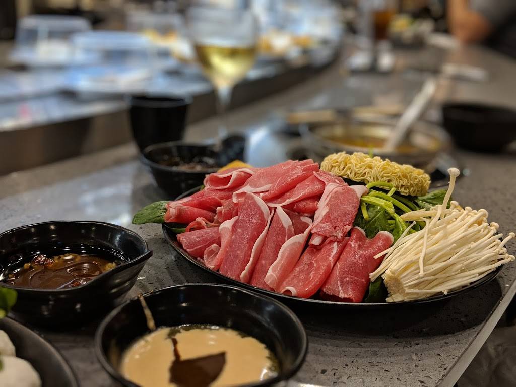 Top Top Hotpot | restaurant | 504 N Alafaya Trail Suite 119, Orlando, FL 32828, USA | 4079018888 OR +1 407-901-8888