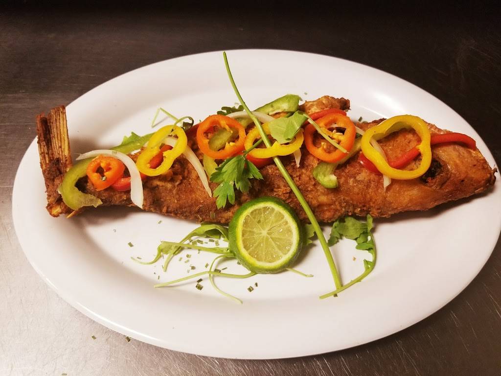 Kizin Creole Restaurant | restaurant | 2311 Howard St, Chicago, IL 60645, USA | 7739617275 OR +1 773-961-7275