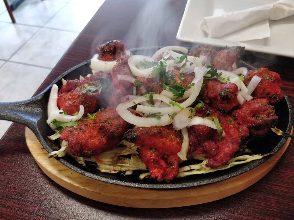 Kurry Houzz & Grill | restaurant | 427 St Clair St, Chatham, ON N7L 3K4, Canada | 5193513999 OR +1 519-351-3999