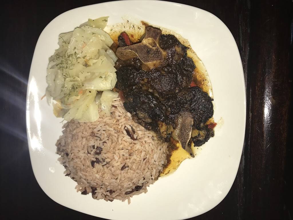 Caribbean Vybz Bar & Grille | restaurant | 7114 St Clair Ave, Cleveland, OH 44103, USA | 2168628878 OR +1 216-862-8878