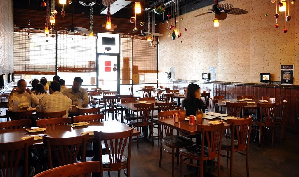 Banana Leaf | restaurant | 9889 Bellaire Blvd #311, Houston, TX 77036, USA | 7137718118 OR +1 713-771-8118