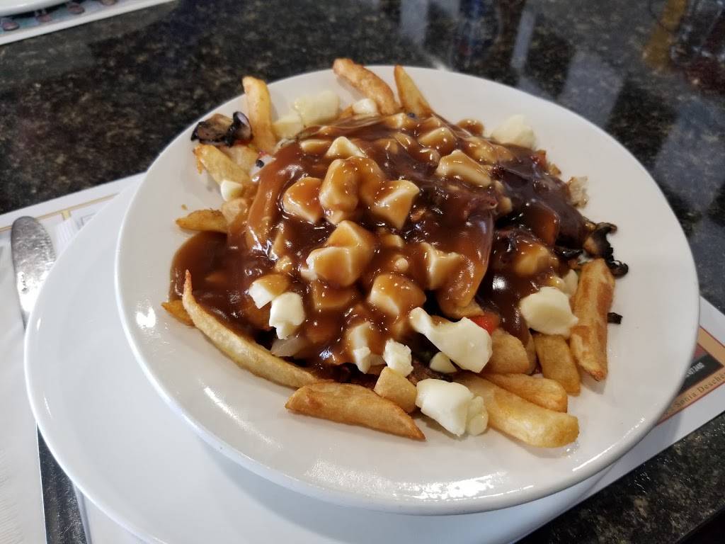 Patio-Vidal | restaurant | 411 Boulevard Saint-René E, Gatineau, QC J8P 8B1, Canada | 8196631717 OR +1 819-663-1717